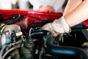 Car being repaired by mechanic