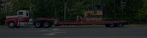 Towing earth moving machine
